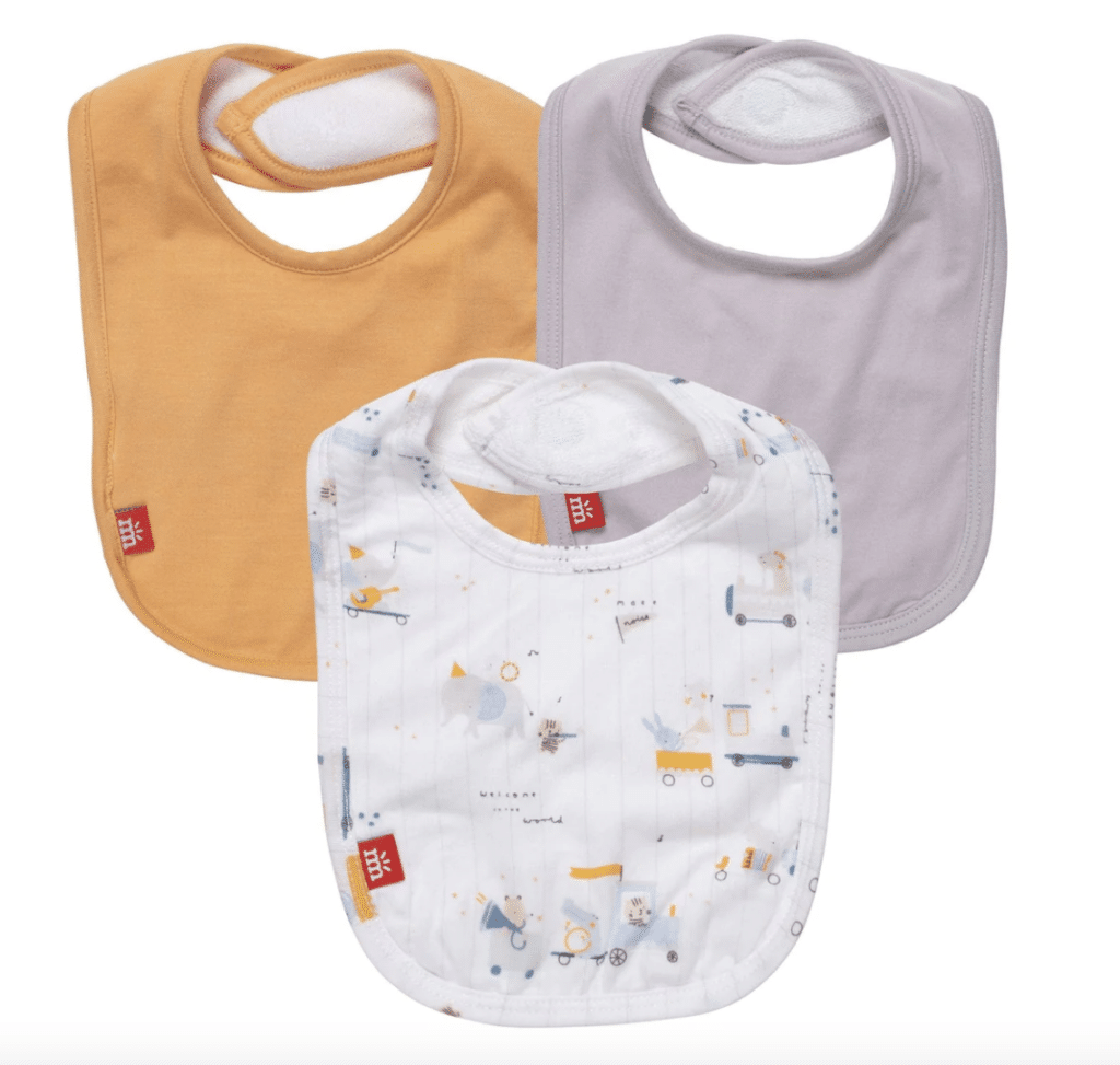 magnetic bibs to keep babies dry from spills with spoon feeding or baby led weaning 